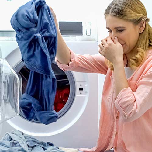 vaskemaskinen lugter